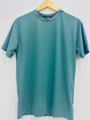 A teal-colored men's athletic t-shirt made from moisture-wicking polyester fabric, displayed on a wooden hanger against a white background. The t-shirt features a crew neck, short sleeves, and a sleek, breathable design.